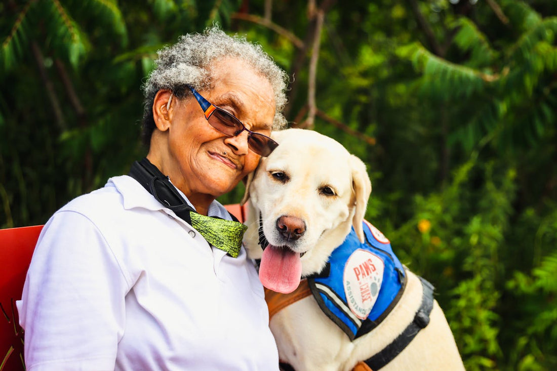 An example of a woman and her dog together, capturing the question why people and pets age